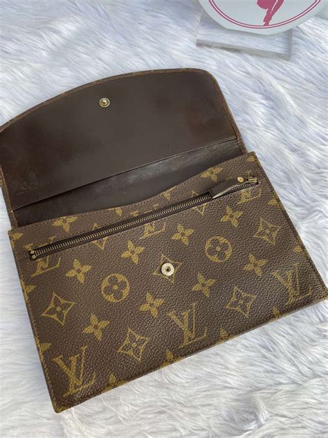 replica louis vuitton wrist band|louis vuitton wallet false.